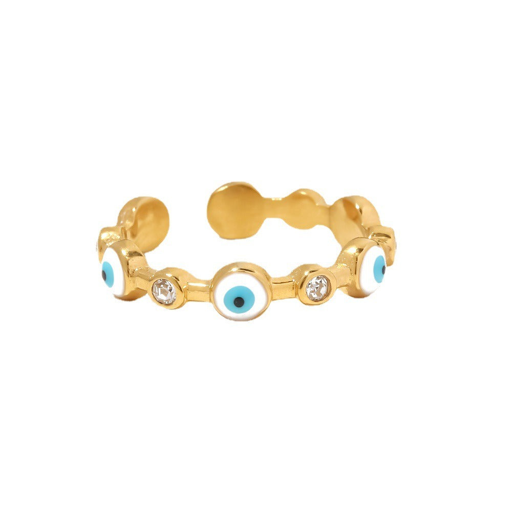 Stainless steel
Evil eye blue designed charms
Statement ring
open back design slight adjustable
Tarnish free &amp; waterproof

Ring height: 6.5mm

Weight: 3g
Choose your size

Available in gold