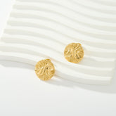 Stainless steel
Tarnish free &amp; waterproof
12mm diameter x 4mm thickness
Weight per pair: 2.5g
Available in gold &amp; silver